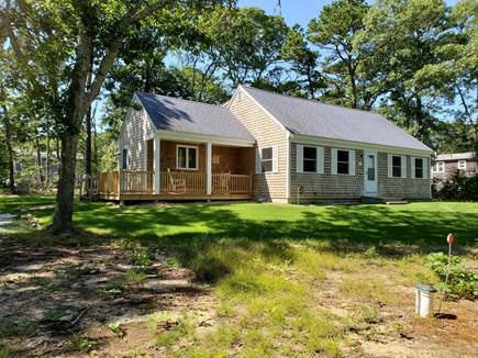 Eastham Cape Cod vacation rental - Front of House with porch to relax in the 2 rocking chairs