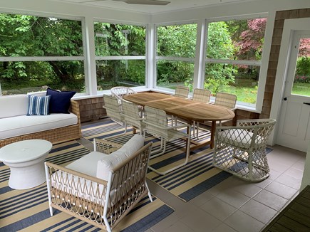 Brewster Cape Cod vacation rental - Screened in porch overlooks front lawn and back lawn & pond.