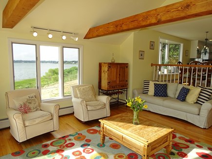 Eastham / Orleans Cape Cod vacation rental - Living room showing more water views, stairs to dining area