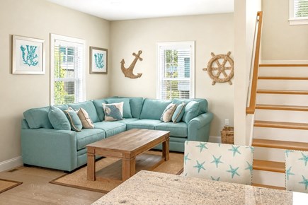 Dennis, Mayflower Beach Cape Cod vacation rental - First floor den with gas fireplace and TV-open to kitchen