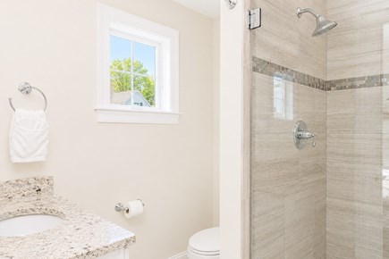Dennis, Mayflower Beach Cape Cod vacation rental - Master bathroom with large tile shower with glass door