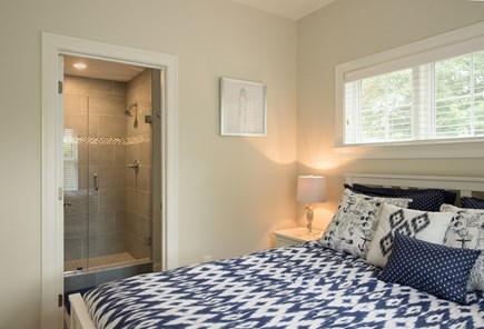 Dennis, Mayflower Beach Cape Cod vacation rental - First floor master bedroom with TV and private bathroom