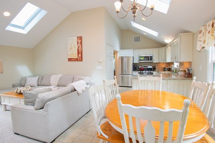 Dennis, Mayflower Beach Cape Cod vacation rental - Family room open to dining and kitchen.