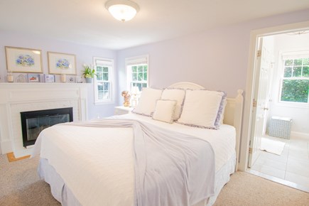 Dennis, Mayflower Beach Cape Cod vacation rental - Bright Master bedroom with gas fireplace, TV, private bathroom.
