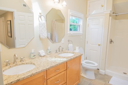 Dennis, Mayflower Beach Cape Cod vacation rental - Guest bathroom with laundry.