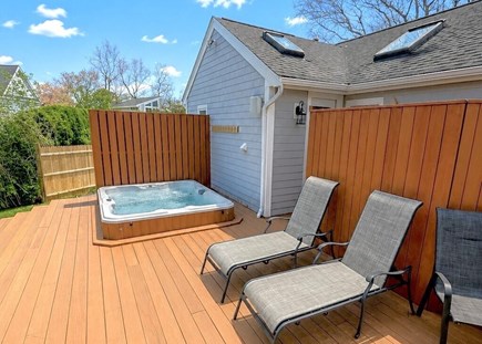 Dennis, Mayflower Beach Cape Cod vacation rental - Large back yard with deck with recessed hot tub, grill, shower.