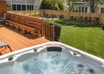 Dennis, Mayflower Beach Cape Cod vacation rental - Hot tub overlooking large yard and firepit area.