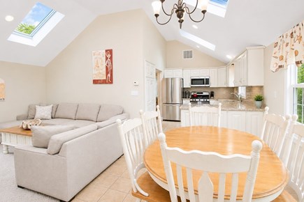 Dennis, Mayflower Beach Cape Cod vacation rental - Family room open to dining and kitchen.