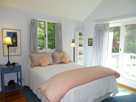 Orleans Cape Cod vacation rental - Bedroom with queen bed, ceiling fan, and slider to bedroom deck
