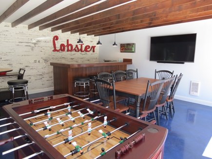Orleans Cape Cod vacation rental - Bar, TV, foos-ball and dining room table for those nights when you might need to eat inside.
