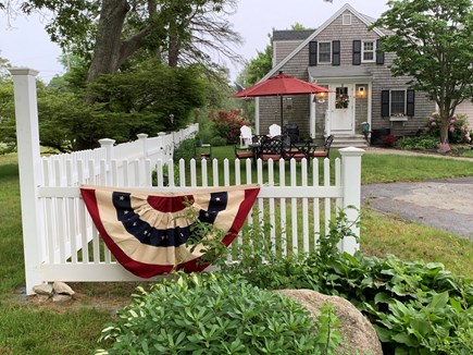 Dennis Village Cape Cod vacation rental - View of Side Yard and Patio