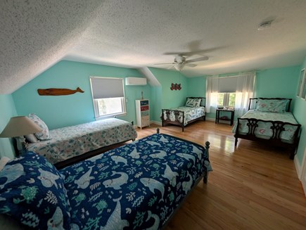Eastham Cape Cod vacation rental - Second floor bedroom with 4-twin beds and wall mounted A/C Unit