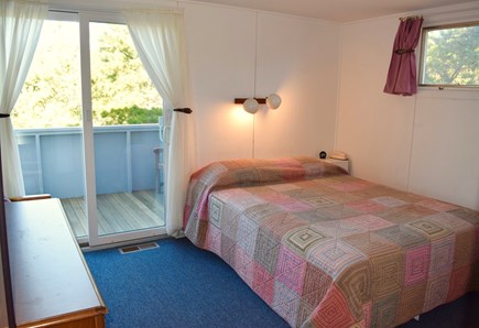 Wellfleet Cape Cod vacation rental - Master bedroom #1 with balcony overlooking yard and large closet