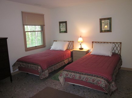 Cotuit Cape Cod vacation rental - Twin bed room upstairs has views of the trees and woods.