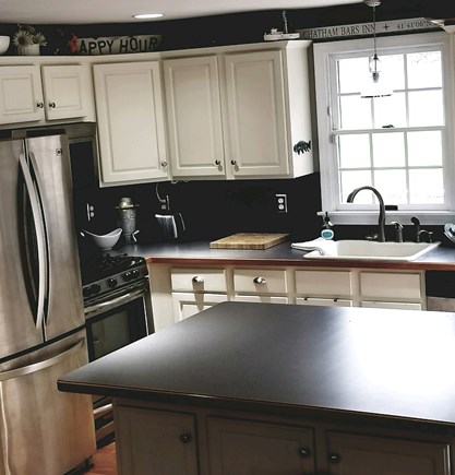 Dennisport Cape Cod vacation rental - Kitchen with new appliances and basin sink ideal for lobster bake