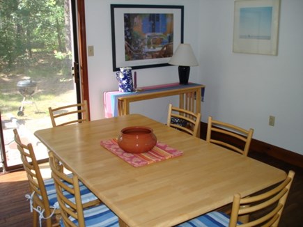 Wellfleet Cape Cod vacation rental - Dining with sliders to back yard patio.