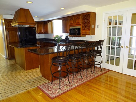 Barnstable Village Cape Cod vacation rental - Kitchen-Gleaming Granite Counters, convection oven, breakfast bar