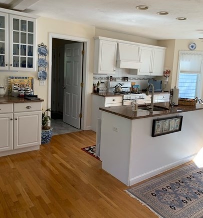 New Seabury Cape Cod vacation rental - KItchen and doorway leading to first floor laundry and garage
