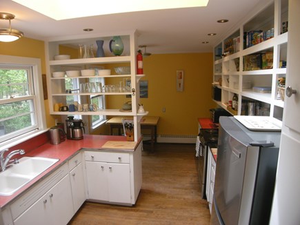 E Orleans / Orleans Village Cape Cod vacation rental - Kitchen, looking toward alcove & back door. Generously equipped.