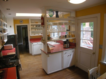 E Orleans / Orleans Village Cape Cod vacation rental - Kitchen, looking toward den. New stove & frig & dished for 2022.