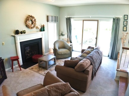 Ocean Edge Cape Cod vacation rental - The living room with gas fireplace opens to spacious deck.