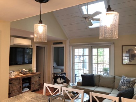 Maushop Village, New Seabury Cape Cod vacation rental - Includes a cathedral ceiling, slider, skylight and flat panel TV.