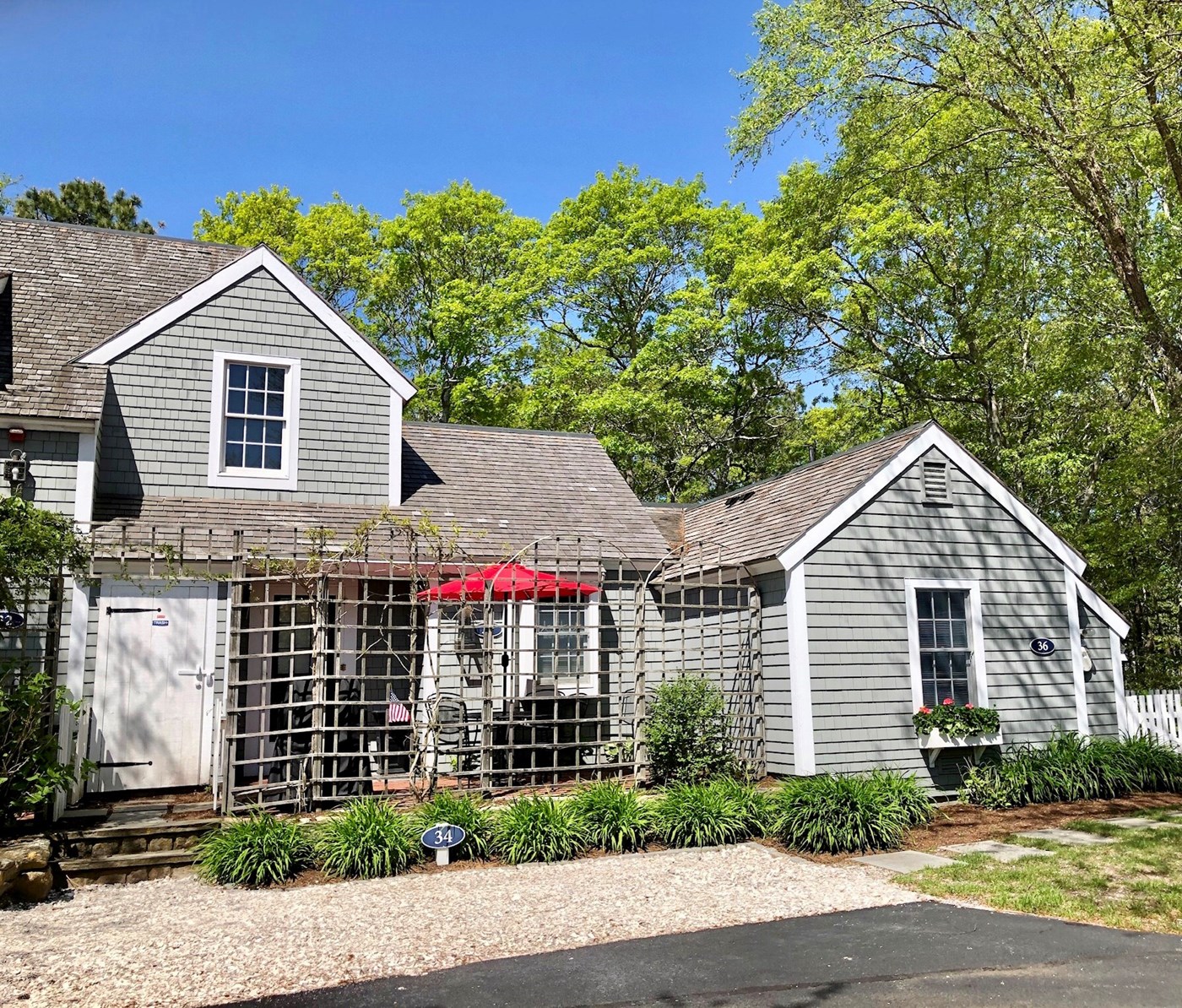 The inviting living area is open to the kitchen and rear patio.