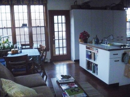 Woods Hole, Nobska Point Cape Cod vacation rental - Kitchen with table for 6 and sitting area with sofa