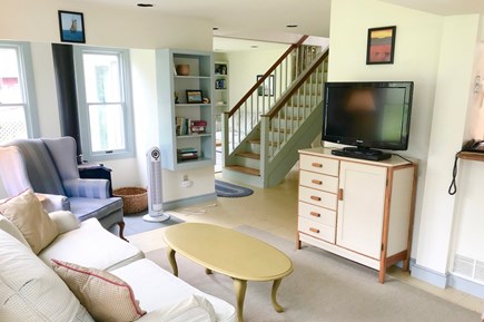Orleans Cape Cod vacation rental - Living Room with sleeping alcove beyond the stairway
