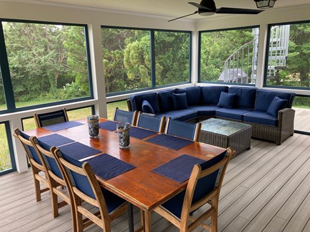 Pochet community, East Orleans Cape Cod vacation rental - Relax & dine on newly renovated screened in porch with ocean view