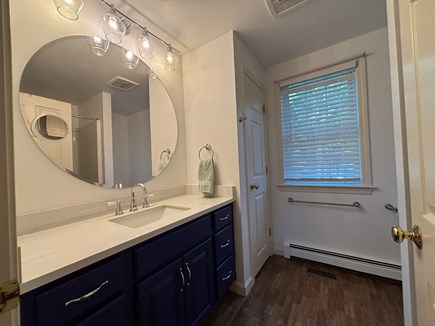 Dennis Village, North of 6A Cape Cod vacation rental - On suite bath vanity first floor with walk in shower