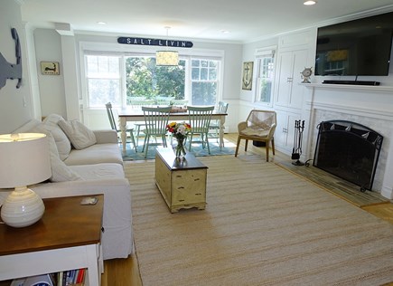 Chatham Cape Cod vacation rental - Living room with TV, opens to dining area