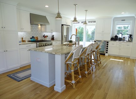 Chatham Cape Cod vacation rental - Kitchen slider out to a huge blue stone patio