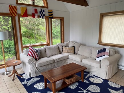Eastham Cape Cod vacation rental - Stylish sunroom - hang out, watch TV, enjoy marsh breezes!