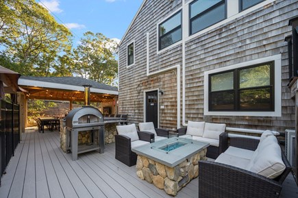 Eastham Cape Cod vacation rental - Outdoor fire pit and pizza oven