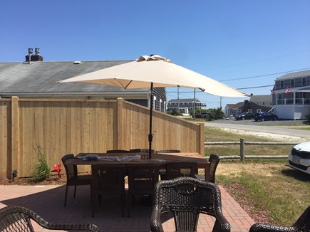 West Dennis Cape Cod vacation rental - Patio with a glimpse of the ocean