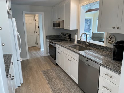 Orleans Cape Cod vacation rental - New kitchen with adjacent first floor laundry area.