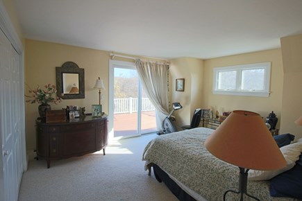 East Dennis Cape Cod vacation rental - The queen size bedroom on 2nd flr w/slider to deck