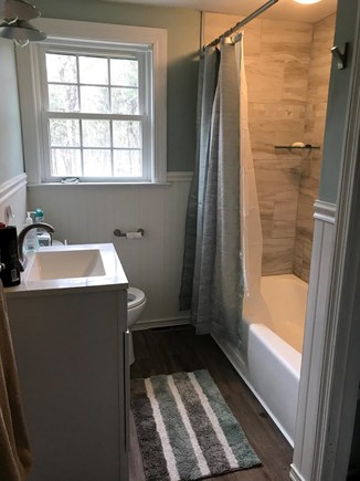 South Dennis Cape Cod vacation rental - Bathroom is newly renovated with bathtub and tile shower