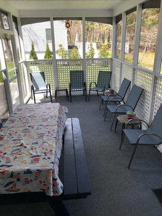 South Dennis Cape Cod vacation rental - Dine in on the large screened porch with tv and picnic table.