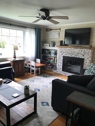South Dennis Cape Cod vacation rental - Sunny bright living room with Wi-Fi and kids table