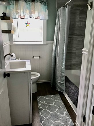 South Dennis Cape Cod vacation rental - Updated bath with tub and new tile shower