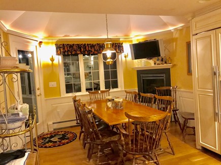 Harwichport, just across from  Cape Cod vacation rental - Kitchen alcove with gas fireplace.