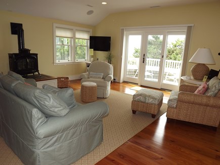 Chatham Cape Cod vacation rental - Upstairs master suite living area with balcony and views.