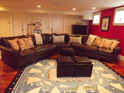 Chatham Cape Cod vacation rental - Lower level living area with tv, pull-out sofa and 2 twin beds.