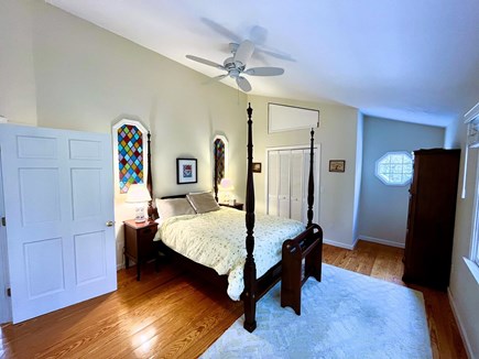 Brewster Cape Cod vacation rental - Primary bedroom on second floor with queen bed and attached bath