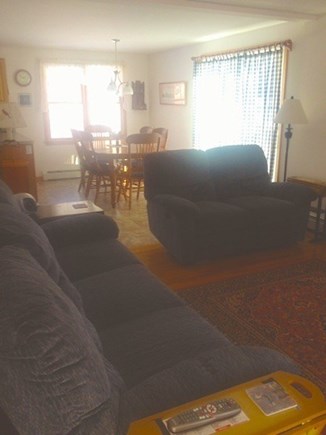 Wellfleet Cape Cod vacation rental - Comfortable open dining living room with sliders out to deck