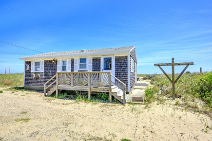 Sagamore Beach Cape Cod vacation rental - Front view of cottage from the roadside.
