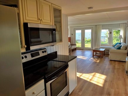 Brewster beachfront  Cape Cod vacation rental - Kitchen with Full sized stove, micro wave and French Door frig,