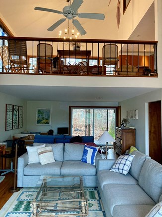 Wellfleet Cape Cod vacation rental - The back living room looking up at the dining room.